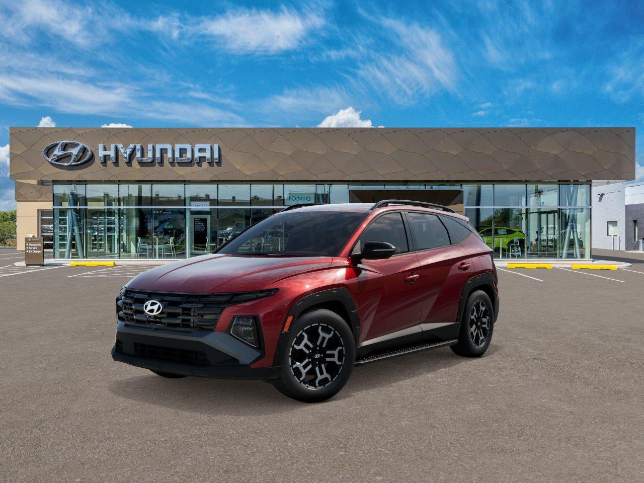 2026 Hyundai TUCSON XRT FWD in Ultimate Red — front three-quarter view