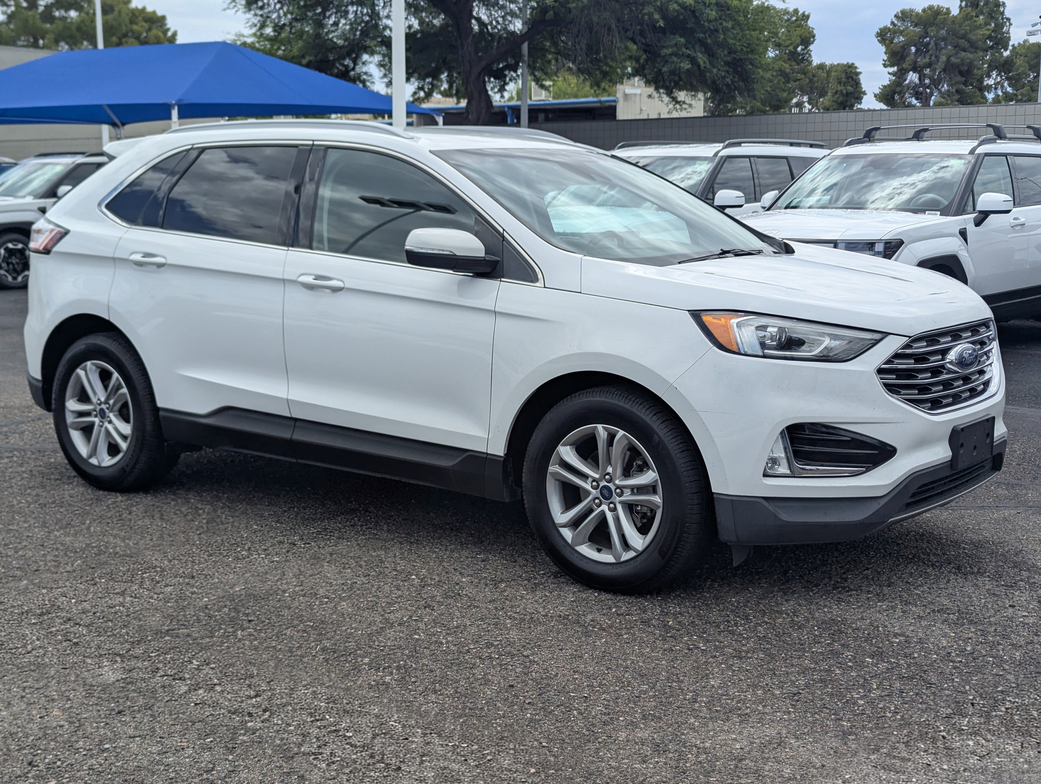 2020 Ford Edge SEL in Oxford White — front three-quarter view