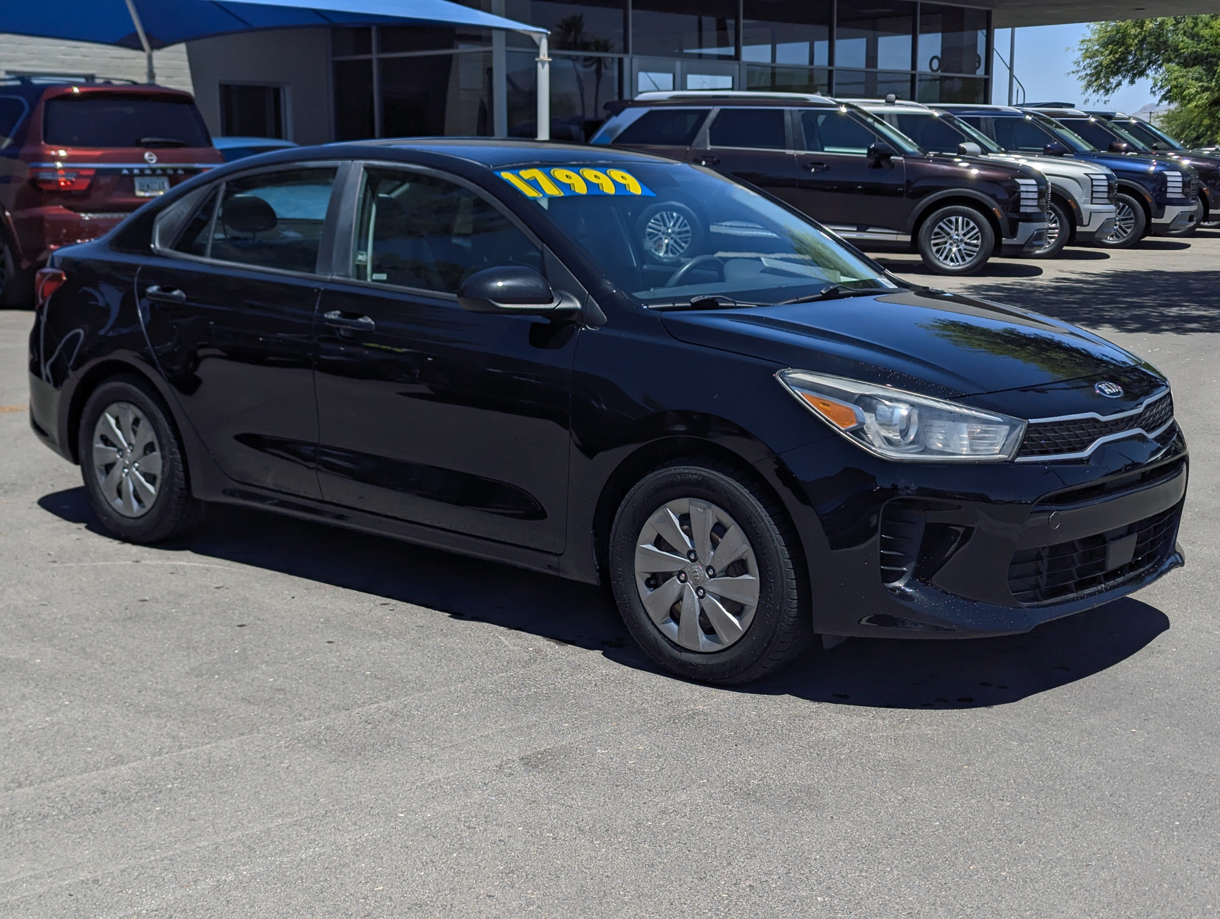 2019 Kia Rio S in Aurora Black — front three-quarter view